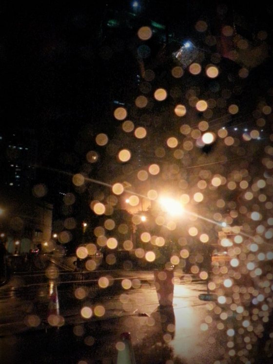 I find joy in looking at lights through droplets of rain on the car windows.