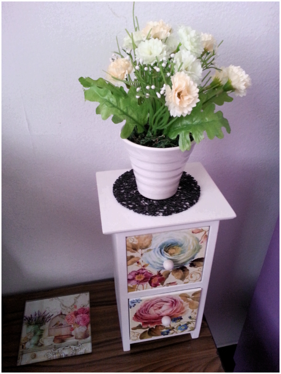 I use a lot of flowers in my room to brighten it up, just like this pot of fake flowers from SM department store